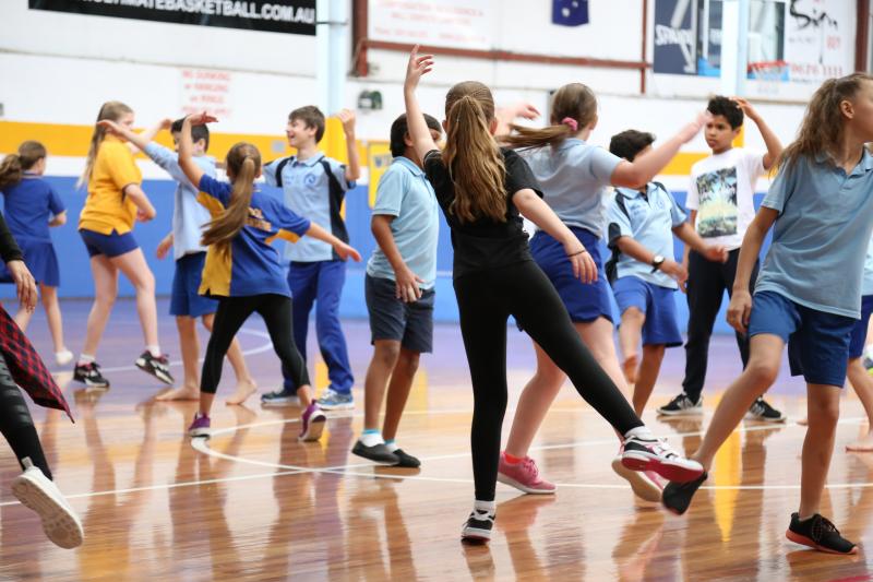 Students dancing at the Primary Aboriginal Dance Workshop